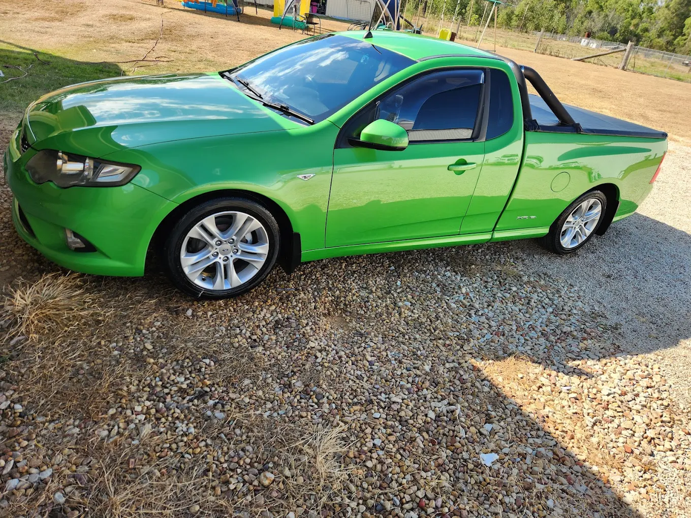 Vibrant green pickup truck with ceramic coating protection